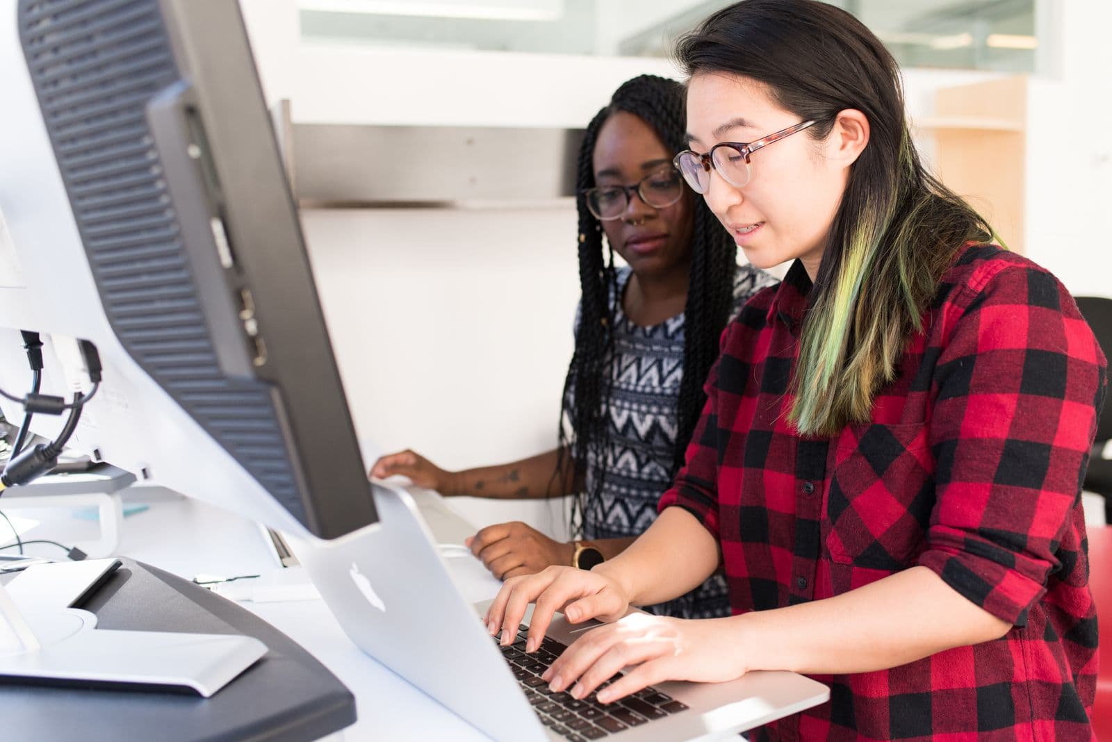 Engineers collaborating on an application
